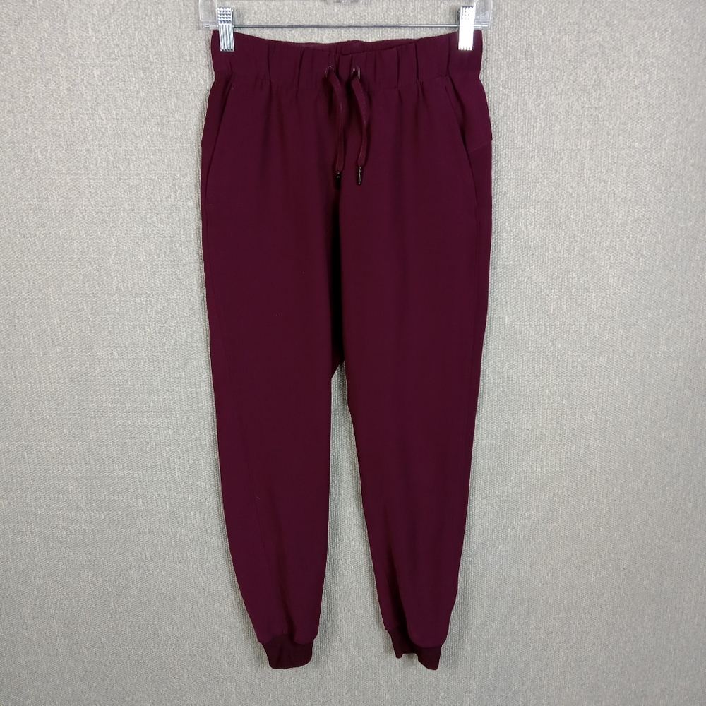 Lululemon On The Fly Jogger 28" Size 2 Burgundy Travel Athleisure Lounge Casual